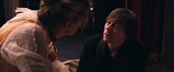 Movie still from “Venus in Fur” (2013), directed by Roman Polanski – A man and a woman sitting in front of each other; Close Up shot, Over the shoulder angle