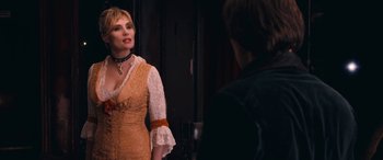 Movie still from “Venus in Fur” (2013), directed by Roman Polanski – A woman in a dress and a man in a black shirt; Medium shot, Over the shoulder angle
