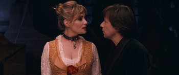 Movie still from “Venus in Fur” (2013), directed by Roman Polanski – A man and a woman standing next to each other; Close Up shot, Over the shoulder angle