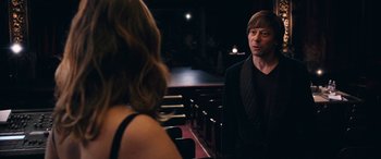 Movie still from “Venus in Fur” (2013), directed by Roman Polanski – A man and a woman in front of an audience; Medium shot, Over the shoulder angle
