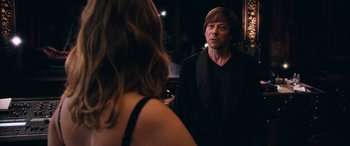 Movie still from “Venus in Fur” (2013), directed by Roman Polanski – A man and a woman looking at one another in the mirror; Medium shot, Over the shoulder angle