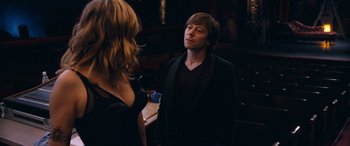 Movie still from “Venus in Fur” (2013), directed by Roman Polanski – A man and a woman are talking to each other; Medium shot, Over the shoulder angle