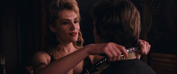Movie still from “Venus in Fur” (2013), directed by Roman Polanski – A woman holding a man's hand in a dark room; Close Up shot, Over the shoulder angle