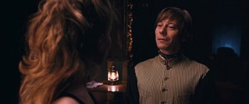Movie still from “Venus in Fur” (2013), directed by Roman Polanski – A man and a woman are standing next to each other in a room; Close Up shot, Over the shoulder angle