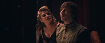 Movie still from “Venus in Fur” (2013), directed by Roman Polanski – A man and a woman standing next to each other; Close Up shot, Over the shoulder angle