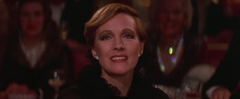 A person wearing a black dress