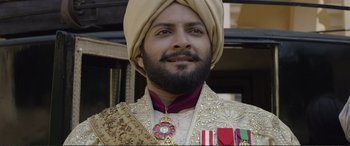 Movie still from “Victoria & Abdul” (2017), directed by Stephen Frears – A man with a beard wearing a turban; Close Up shot, Low angle