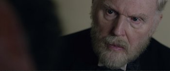 Movie still from “Victoria & Abdul” (2017), directed by Stephen Frears – A person with a beard; Close Up shot, Over the shoulder angle