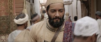Movie still from “Victoria & Abdul” (2017), directed by Stephen Frears – A man with a long beard and a turban; Close Up shot, Low angle