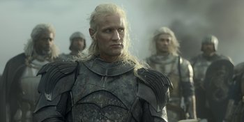 Movie still from “House of the Dragon” (2022), created by George R.R. Martin – A group of men dressed in medieval armor; Close Up shot, Low angle