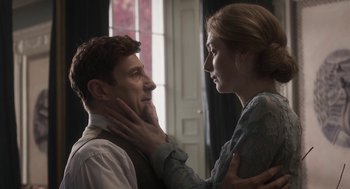Movie still from “Vita & Virginia” (2018), directed by Chanya Button – A man and a woman touching their necks; Close Up shot, Low angle