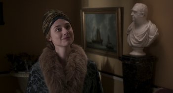 Movie still from “Vita & Virginia” (2018), directed by Chanya Button – A woman in a fur coat and a fur hat; Close Up shot, Low angle
