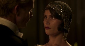 Movie still from “Vita & Virginia” (2018), directed by Chanya Button – A man and a woman looking at one another; Close Up shot, Over the shoulder angle