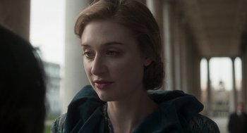 Movie still from “Vita & Virginia” (2018), directed by Chanya Button – A person wearing a jacket; Close Up shot, Over the shoulder angle