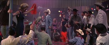 Movie still from “Viva Las Vegas” (1964), directed by George Sidney – A group of people dancing in a room with lights; Wide shot, Low angle