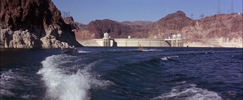 Movie still from “Viva Las Vegas” (1964), directed by George Sidney – Two people are surfing in a body of water; Extreme Wide shot, Low angle