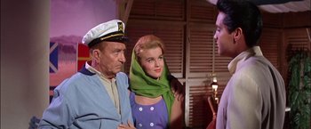 Movie still from “Viva Las Vegas” (1964), directed by George Sidney – A man and a woman wearing a sailor's hat; Medium shot, Low angle