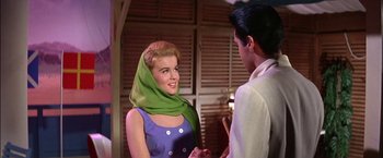 Movie still from “Viva Las Vegas” (1964), directed by George Sidney – A man and a woman talking to each other; Medium shot, Low angle