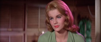 Movie still from “Viva Las Vegas” (1964), directed by George Sidney – A person wearing a green shirt; Close Up shot, Low angle