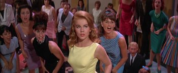 Movie still from “Viva Las Vegas” (1964), directed by George Sidney – A group of women are dancing in a room together; Medium shot, Low angle