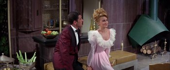 Movie still from “Viva Las Vegas” (1964), directed by George Sidney – A man and a woman dressed in formal wear; Medium shot, Over the shoulder angle