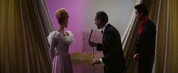 Movie still from “Viva Las Vegas” (1964), directed by George Sidney – A man and a woman are talking to each other; Medium shot, Low angle