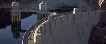 Movie still from “Viva Las Vegas” (1964), directed by George Sidney – A view of a dam from a helicopter; Extreme Wide shot, High angle