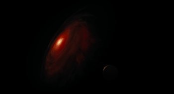 Movie still from “Voyage of Time” (2016), directed by Terrence Malick – A picture of the sun and moon in the dark sky; Extreme Wide shot, Overhead angle