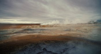 Movie still from “Voyage of Time” (2016), directed by Terrence Malick – A view of a very hot and steamy area; Extreme Wide shot, High angle