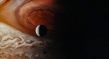 Movie still from “Voyage of Time” (2016), directed by Terrence Malick – An image of an exoplanet in the sky; Extreme Wide shot, Overhead angle