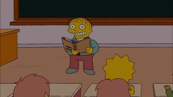 Movie still from “Waiting for Superman” (2010), directed by Davis Guggenheim – A man reading a book in front of a group of people; Medium shot, High angle