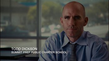 Movie still from “Waiting for Superman” (2010), directed by Davis Guggenheim – A man in a blue dress shirt and a tie; Close Up shot, Low angle