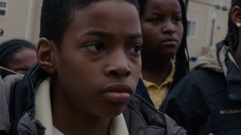 Movie still from “Waiting for Superman” (2010), directed by Davis Guggenheim – Two young boys are looking at the camera; Close Up shot, Low angle