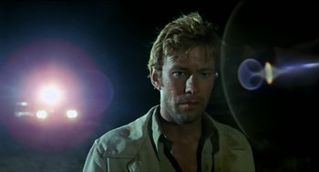 Movie still from “Wake in Fright” (1971), directed by Ted Kotcheff – A person wearing a shirt; Close Up shot, Low angle