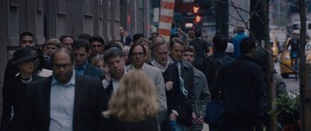 Movie still from “Wakefield” (2016), directed by Robin Swicord – A crowd of people walking down a street; Wide shot, Over the shoulder angle