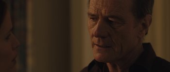 Movie still from “Wakefield” (2016), directed by Robin Swicord – An older man with a cigarette in his mouth; Close Up shot, Over the shoulder angle