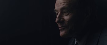 Movie still from “Wakefield” (2016), directed by Robin Swicord – A man's face in the dark; Close Up shot, Over the shoulder angle