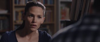 Movie still from “Wakefield” (2016), directed by Robin Swicord – A person sitting in front of a book shelf; Close Up shot, Over the shoulder angle