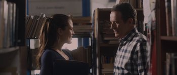 Movie still from “Wakefield” (2016), directed by Robin Swicord – A man and a woman are smiling at each other; Close Up shot, Over the shoulder angle