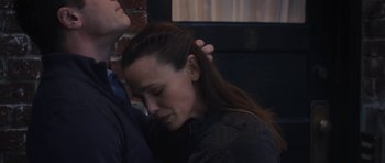 Movie still from “Wakefield” (2016), directed by Robin Swicord – A woman with her head on top of a man's shoulder; Close Up shot, High angle