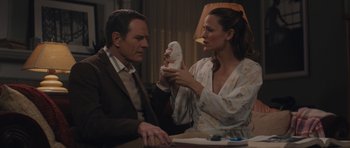 Movie still from “Wakefield” (2016), directed by Robin Swicord – A man and a woman sitting at a table; Medium shot, Over the shoulder angle