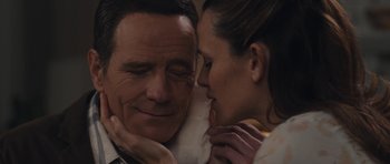 Movie still from “Wakefield” (2016), directed by Robin Swicord – A man and a woman embracing each other in front of a mirror; Close Up shot, Over the shoulder angle