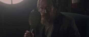 Movie still from “Wakefield” (2016), directed by Robin Swicord – An old man with a beard looking into a mirror; Close Up shot, Over the shoulder angle