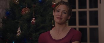 Movie still from “Wakefield” (2016), directed by Robin Swicord – A woman sitting in front of a christmas tree; Close Up shot, Over the shoulder angle