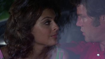 Movie still from “Walking Tall” (1973), directed by Phil Karlson – A man and a woman looking into each other's eyes; Close Up shot, Over the shoulder angle