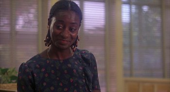 Movie still from “WarGames” (1983), directed by John Badham – A person wearing a dress; Close Up shot, Over the shoulder angle