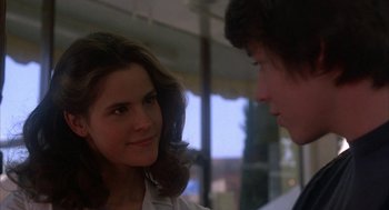 Movie still from “WarGames” (1983), directed by John Badham – A man and a woman talking to each other; Close Up shot, Over the shoulder angle