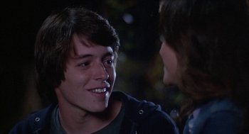 Movie still from “WarGames” (1983), directed by John Badham – A man and a woman talking to each other; Close Up shot, Over the shoulder angle