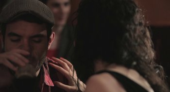 Movie still from “Weekend” (2011), directed by Andrew Haigh – A man and a woman are talking to each other; Close Up shot, Over the shoulder angle