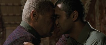 Movie still from “Whale Rider” (2002), directed by Niki Caro – A couple of people that are kissing each other; Close Up shot, Over the shoulder angle